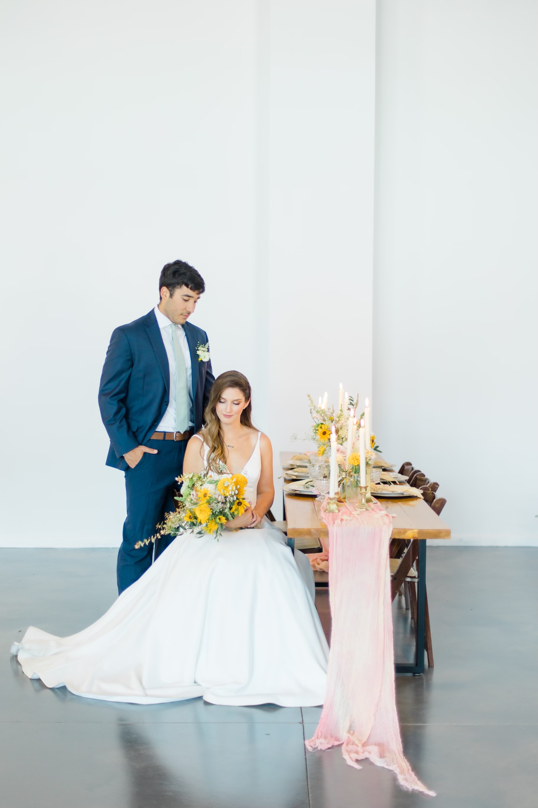 Bride and groom sharing a quiet moment at their sweetheart table